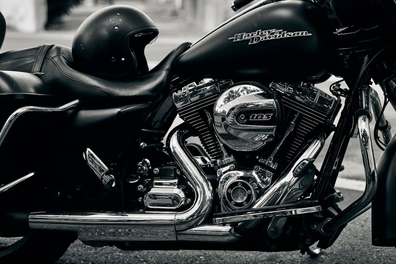 Close-up black and white image of a Harley-Davidson motorcycle