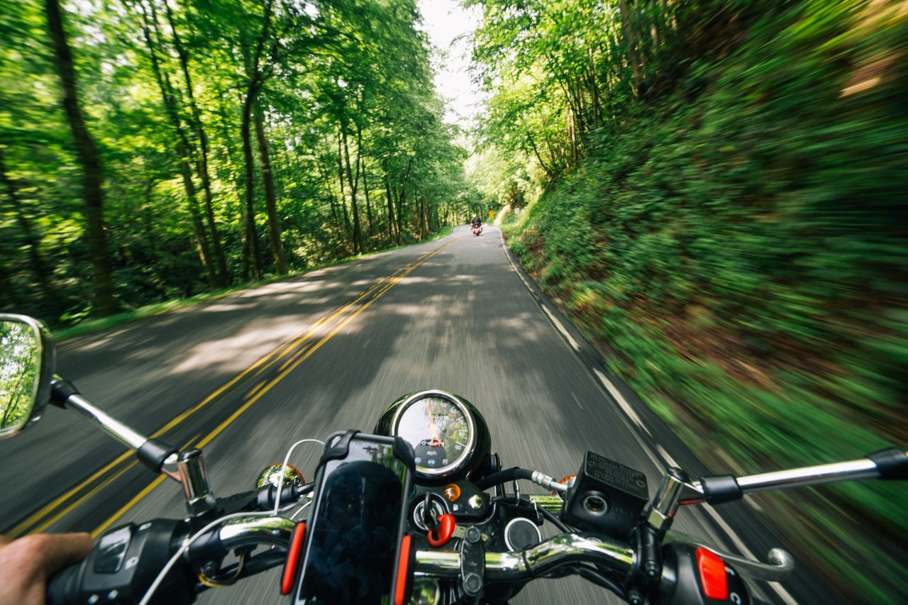 Person accelerating on a motorcycle