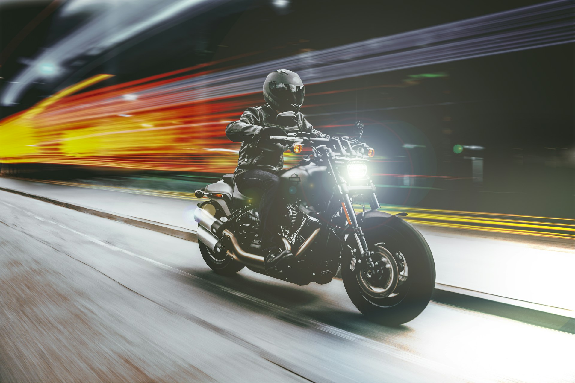 person riding motorcycle night